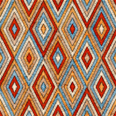 Embroidered seamless geometric pattern. Ornament for the carpet. Ethnic and tribal motifs. Vintage grunge texture. Colorful print of handmade. Orange, gray, black and blue colors. Vector art.