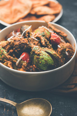 Undhiyu is a Gujarati mixed vegetable dish, specialty of Surat, India. Served in a bowl with or without poori