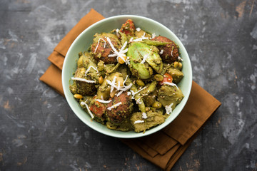 Undhiyu is a Gujarati mixed vegetable dish, specialty of Surat, India. Served in a bowl with or without poori