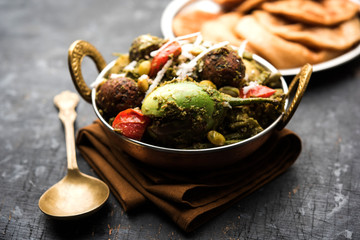 Undhiyu is a Gujarati mixed vegetable dish, specialty of Surat, India. Served in a bowl with or without poori