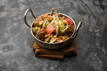 Undhiyu is a Gujarati mixed vegetable dish, specialty of Surat, India. Served in a bowl with or without poori