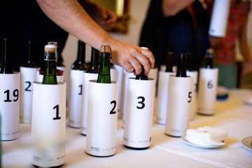 blind wine tasting bottle preparation with numbers