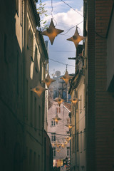 Street with decorative lanterns in Riga