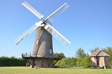 Fototapeta na wymiar Historical windmill in a rural area in England