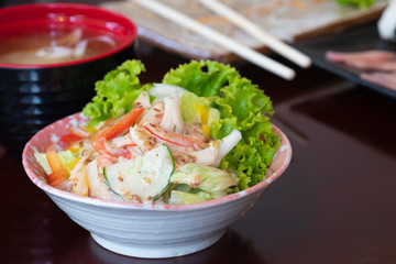 Fresh vegetable salad with crab stick in japanese restaurant, japanese food.