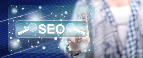 Woman touching a seo concept