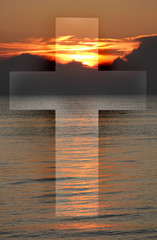 Cross from sky and sea against a background of dark clouds