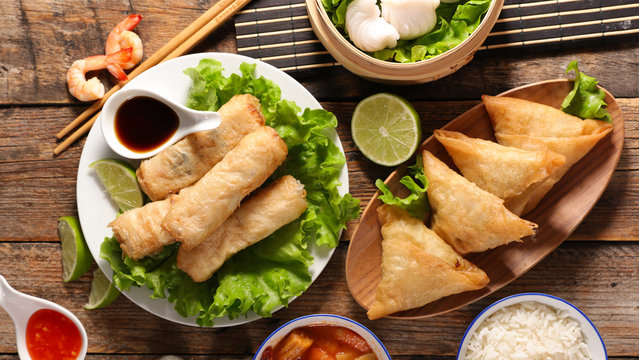 selection of asian food- spring roll, samosa, fried noodles, soup, rice and  dumpling Stock Photo | Adobe Stock