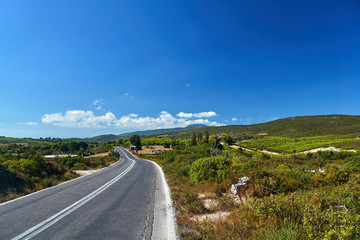 Asphalt road in the mountains of Zakynthos island in Greece.