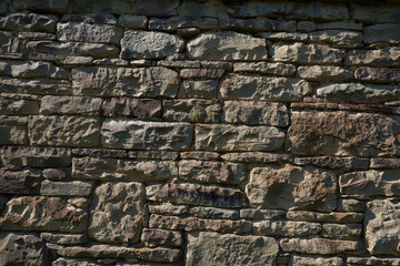 pattern gray color of modern style design decorative uneven cracked real stone wall surface with cement