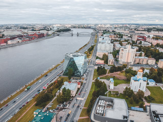 26.07.2019 St. Petersburg, Russia - Aerial photo of a glass skyscraper business center, Bank, Central tower and two buildings of hotel and restaurant complex.