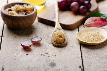Ingredients for body scrub of brown sugar with grape and  oil, eco bio friendly cosmetic for skin care.