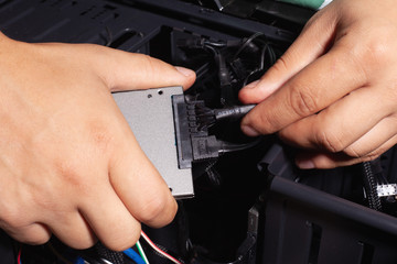 connecting the ssd drive to the cable in the computer