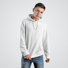 Front view of a white hoodie mockup template for a young guy.