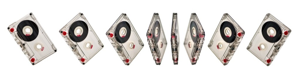 Variation of position of compact audio cassettes in rotation isolated on white background