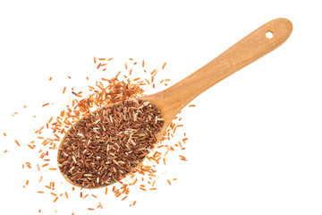 Brown Rice in wooden spoon