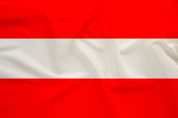 national flag of Austria on delicate silk with wind folds, travel concept, immigration, politics