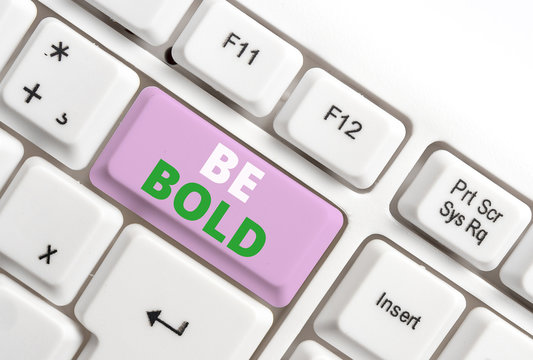 Text sign showing Be Bold. Business photo text Go for it Fix it yourself instead of just talking Tough Hard White pc keyboard with empty note paper above white background key copy space