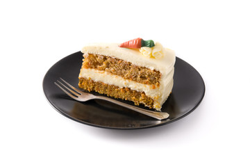 Sweet carrot cake slice on a plate isolated on white background