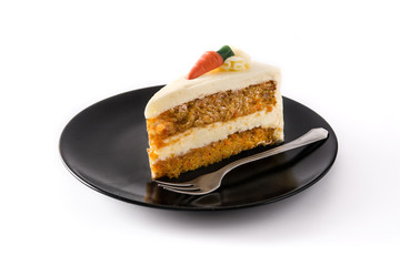 Sweet carrot cake slice on a plate isolated on white background
