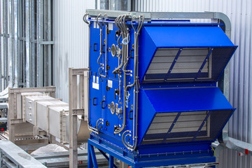 External infrastructure of the microclimate support system at a large industrial site. Air pipelines inlet and exhaust. Fans and air conditioning. Systems of control of pressure, humidity, temperature