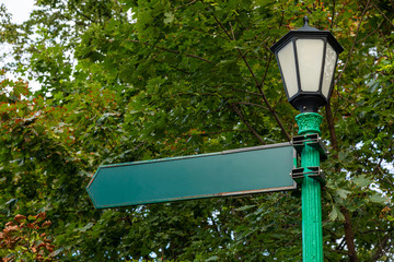 Direction sign on lightpost, classic style