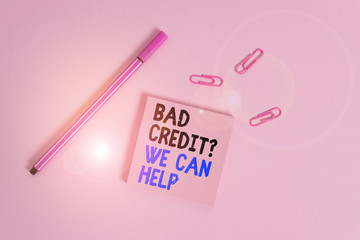 Writing note showing Bad Credit Question We Can Help. Business concept for Borrower with high risk Debts Financial Colored sticky note clips binders gathered pen trendy cool background