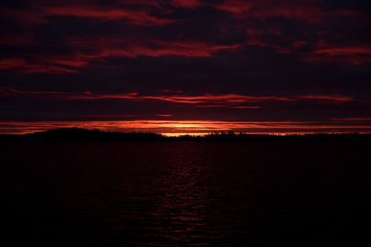 Red sunset over lake