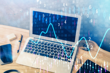 Multi exposure of chart and financial info and work space with computer background. Concept of international online trading.