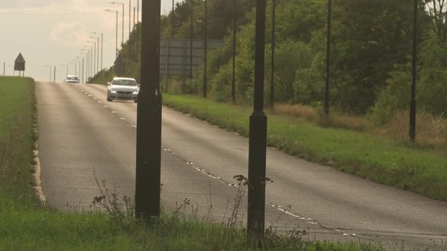 UK Dual carriage way with cars driving towards