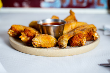 chicken wings with tomato hot sauce