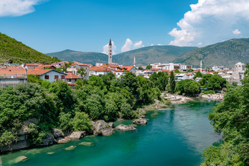 Fototapeta na wymiar Mostar bridge, historic place in yugosavian war. A famous tourist destination in Bosnia and herzegovina former Yuoslavia.