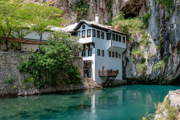 Blagaj Tekija house at cave near Buna river. Blagaj is famouse tourist destination in Bosnia and herzegovina.