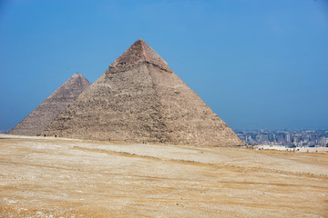 Fototapeta na wymiar Side view of the pyramid of Khafre and the Great pyramid in Giza, Cairo, EgyptGiza, near Cairo, Egypt