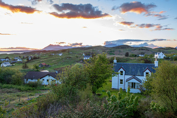Fototapeta na wymiar Isle of Skye, the rural community of Tarskavaig with the Cuillins across the sea loch of Eishort