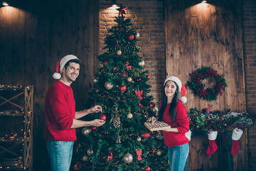 Portrait of nice attractive lovely positive cheerful cheery married spouses spending chistmastime...