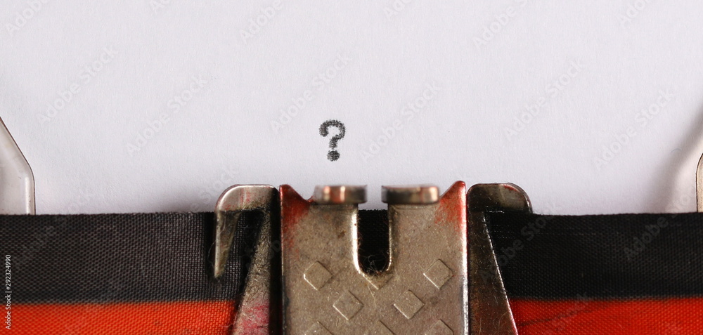 Fototapete typewriter machine with question mark on paper sheet