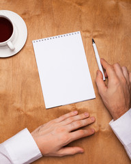 Obraz premium Planning 2020 in a notebook with men's hands