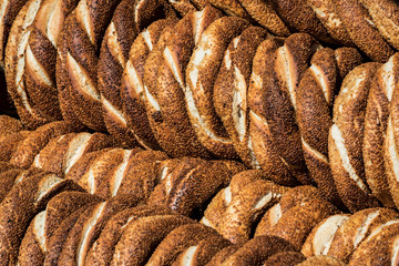 Background with Turkish bagels simit, close-up