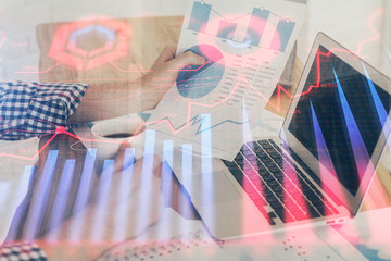 Double exposure hands with stock market chart. Concept of research and analysis.