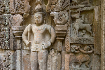 Fototapeta na wymiar Bas-relief mural in Banteay Kdei, Citadel of Monks' cells, a temple in Angkor Wat complex, Siem Reap, Cambodia