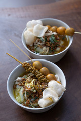 delicious indonesian food of bubur ayam serving with traditional side dishes