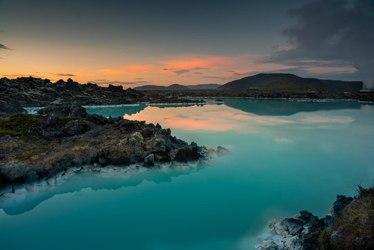 Blue lagoon geothermal spa in Iceland at the sunset.