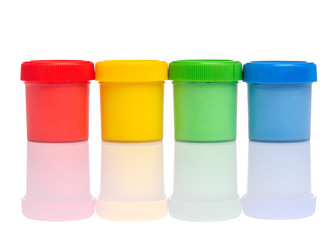 Set of Colorful Gouache jars isolated on white background with copy space. Cans of different colors...