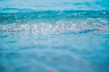 Warm water on the beach of Kallithea, Greece