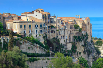 Fototapeta na wymiar Scenic view on side walls of ancient Tropea town on mountain rock, South Italy