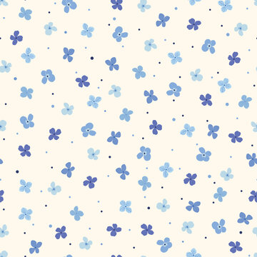 Seamless pattern with simple blue flowers and small dots