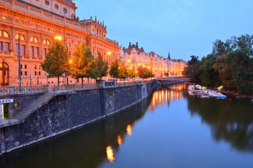Masarykovo embankment (Czech: Masarykovo nábřeží) on Vltava river in the evening. Prague, Czech Republic.