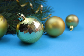 golden colored toys lie on a blue background