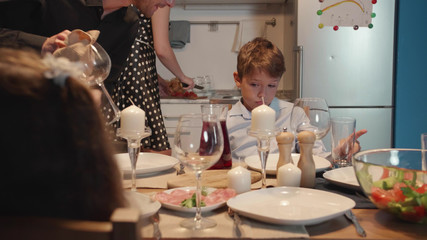Man and woman serve the table.
